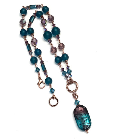 Hand linked beaded copper necklace in the colors of teal and purple